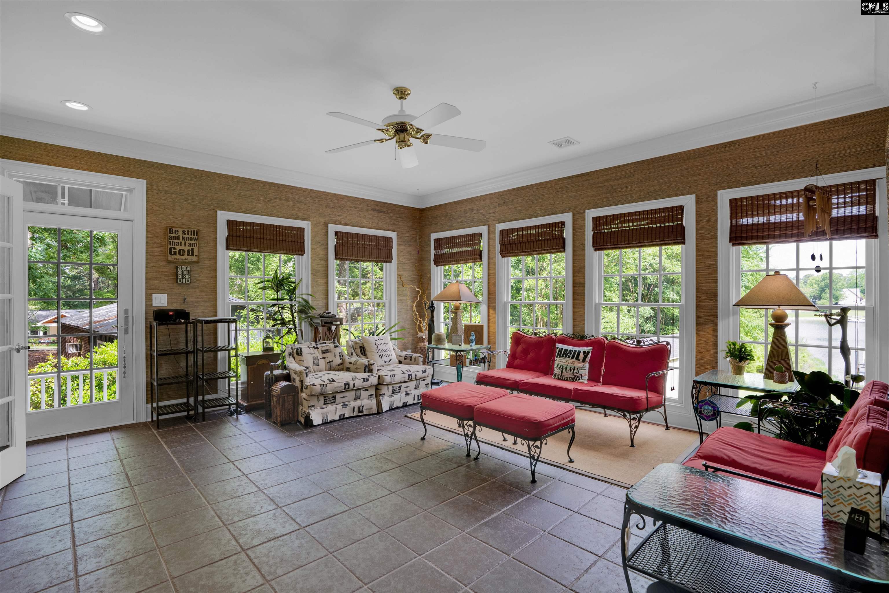 1101 Ellett Road Chapin, SC 29036 - Photo 8 of 24 a living room with furniture and a large window