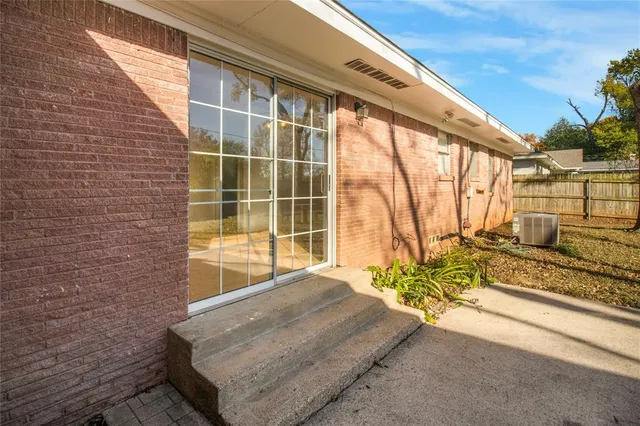 a view of a house with a large window