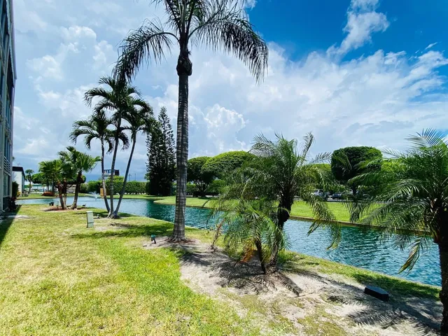 a view of a swimming pool with a table and chair