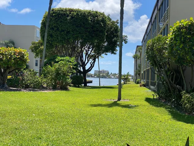 an aerial view of house with yard