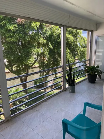 a sitting area with outdoor view