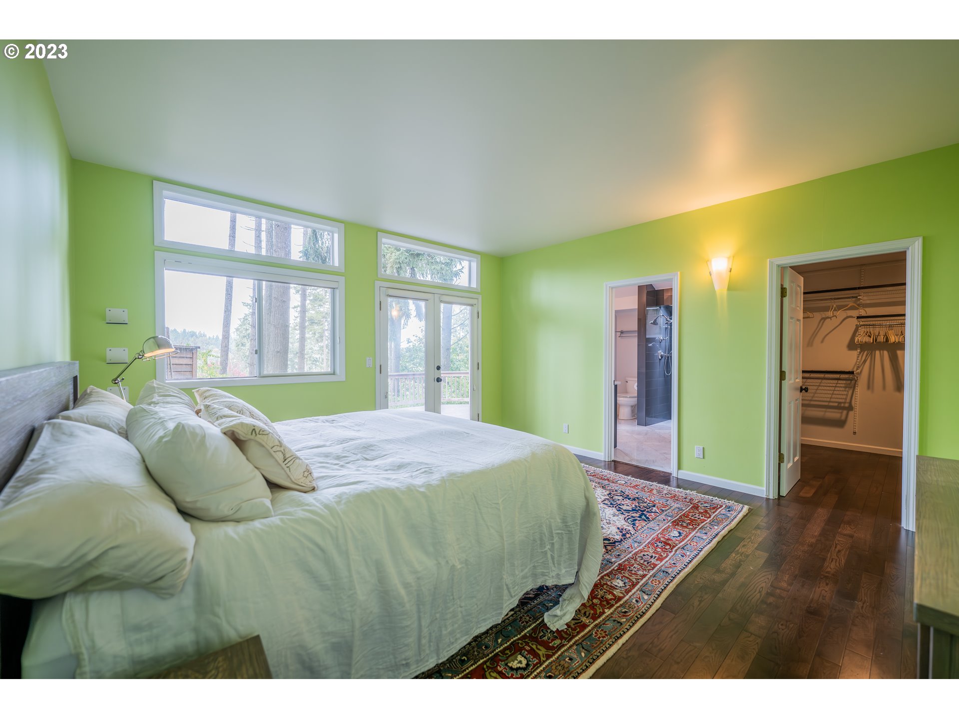 3955 Spring Boulevard Eugene, OR 97405 - Photo 16 of 48 a living room with a bed furniture and a large window