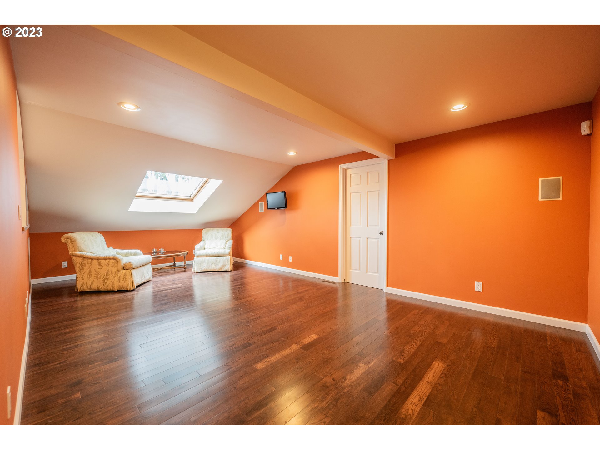 3955 Spring Boulevard Eugene, OR 97405 - Photo 31 of 48 a view of an empty room with wooden floor