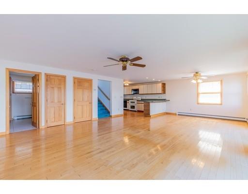82 Lake Attitash Road Amesbury, MA 01913 - Photo 16 of 42 a view of an empty room with a window