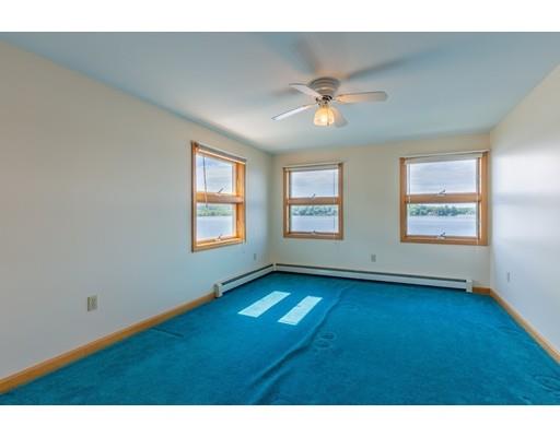 82 Lake Attitash Road Amesbury, MA 01913 - Photo 27 of 42 a view of an empty room with a window