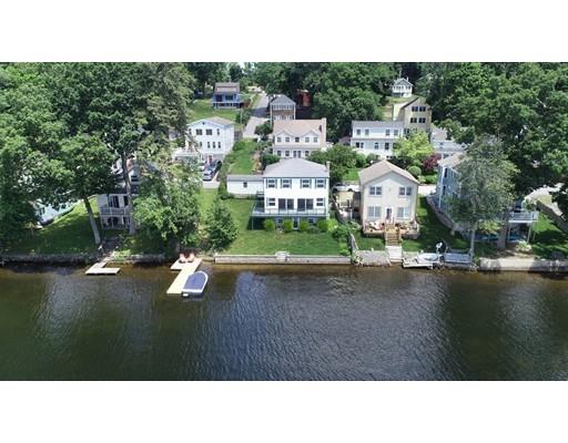 82 Lake Attitash Road Amesbury, MA 01913 - Photo 3 of 42 a open area with lots of trees