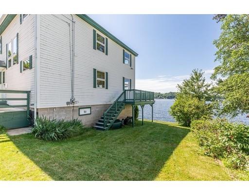 82 Lake Attitash Road Amesbury, MA 01913 - Photo 32 of 42 a view of a house with a backyard
