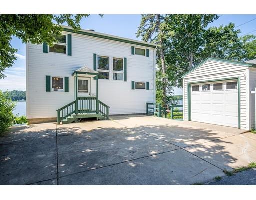 82 Lake Attitash Road Amesbury, MA 01913 - Photo 6 of 42 a view of a house with a yard