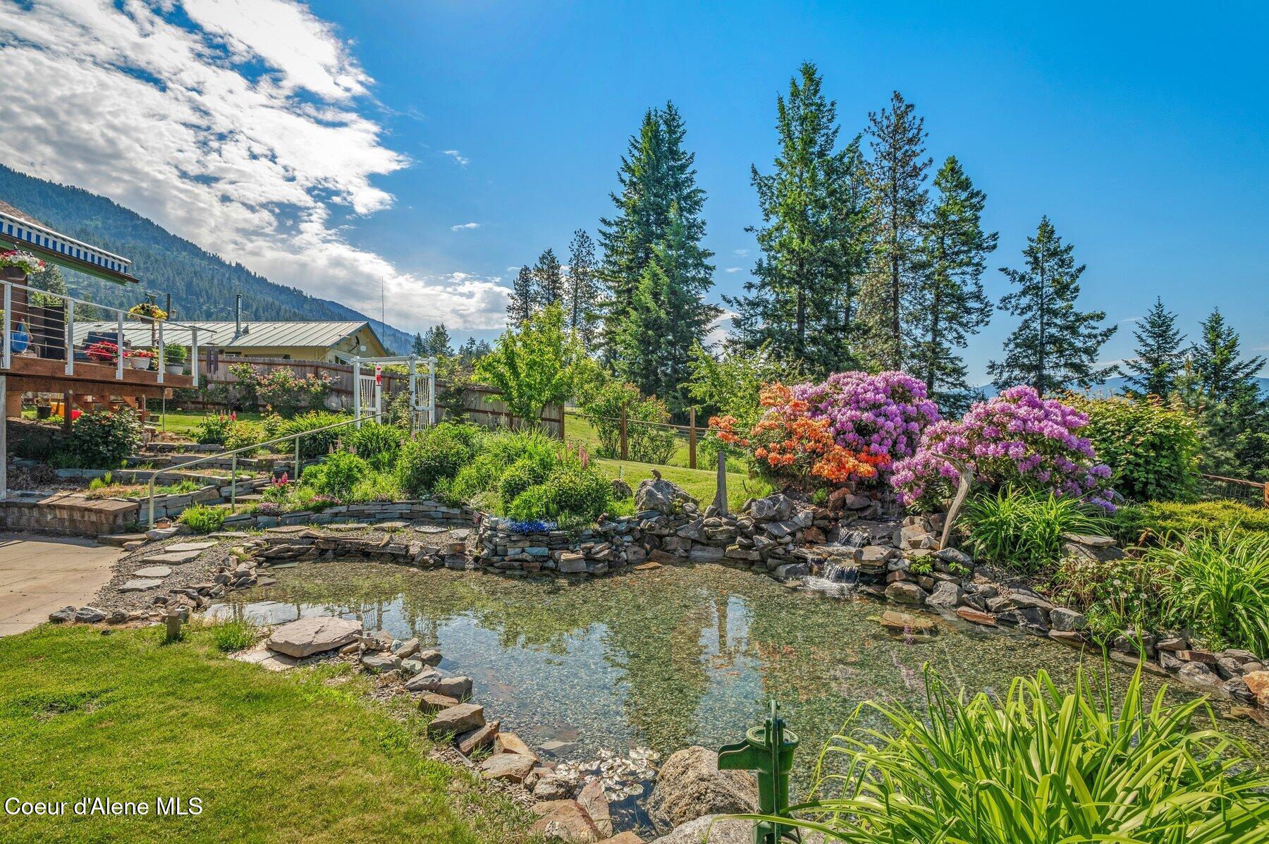 311 School Road Hope, ID 83836 - Photo 6 of 60 Waterfall and Pond
