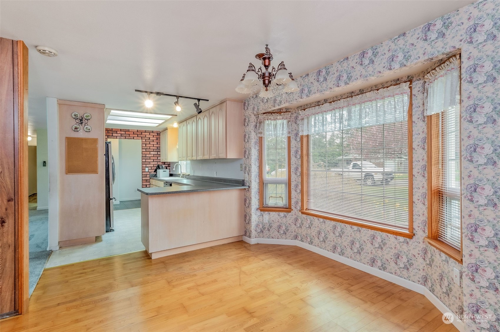720 Memory Lane Port Townsend, WA 98368 - Photo 17 of 33 a view of a kitchen with a dishwasher and a large window