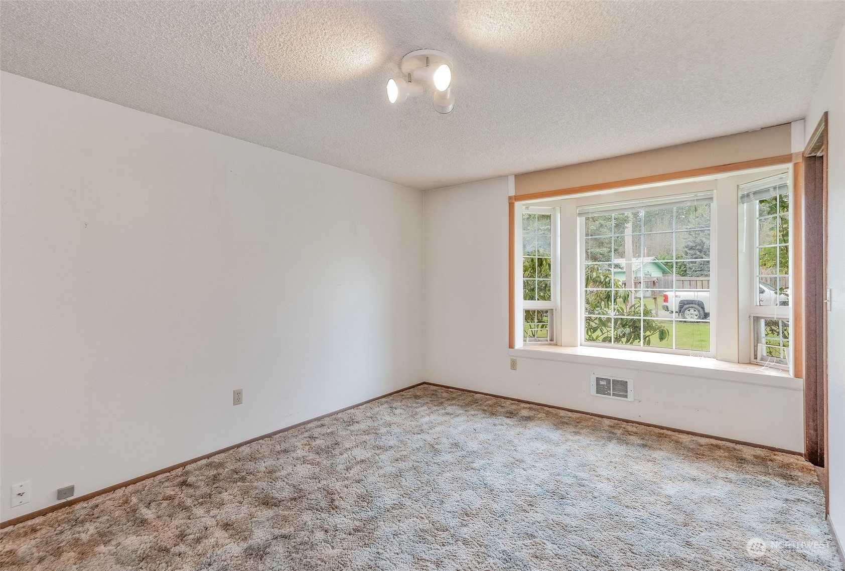 720 Memory Lane Port Townsend, WA 98368 - Photo 21 of 33 a view of an empty room with a window