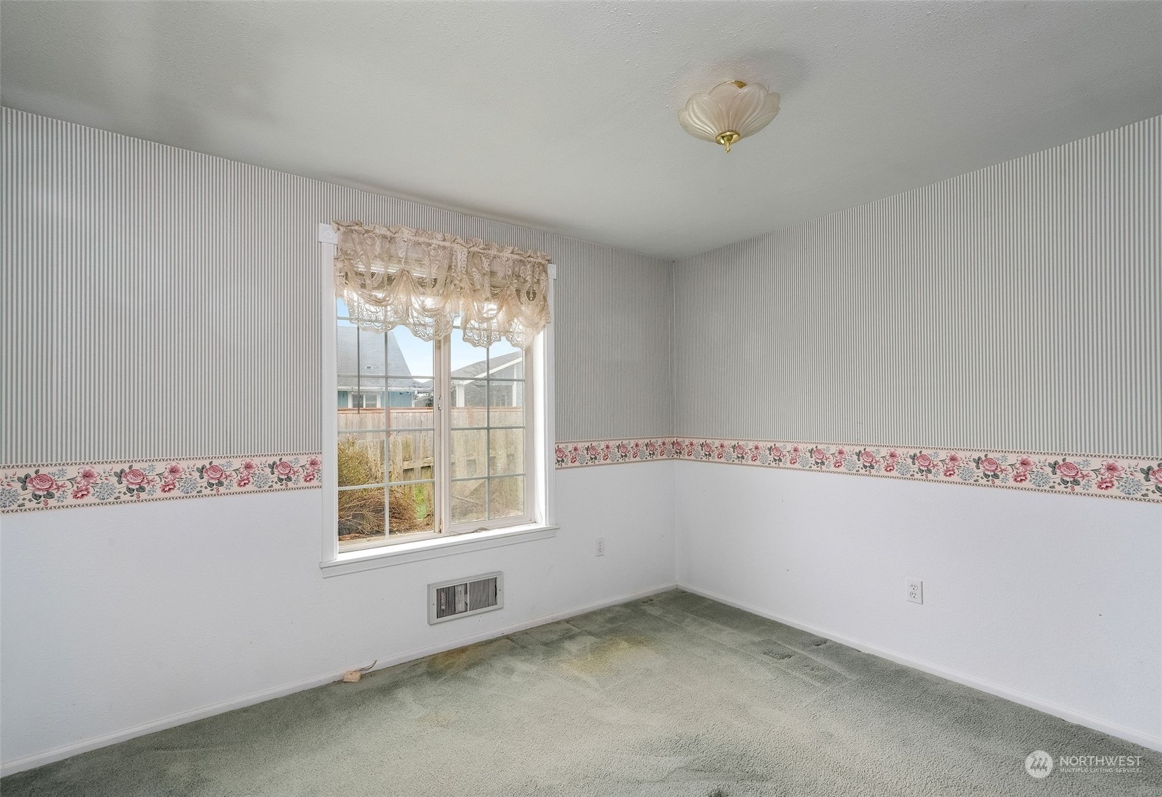 720 Memory Lane Port Townsend, WA 98368 - Photo 24 of 33 a view of an empty room with a window
