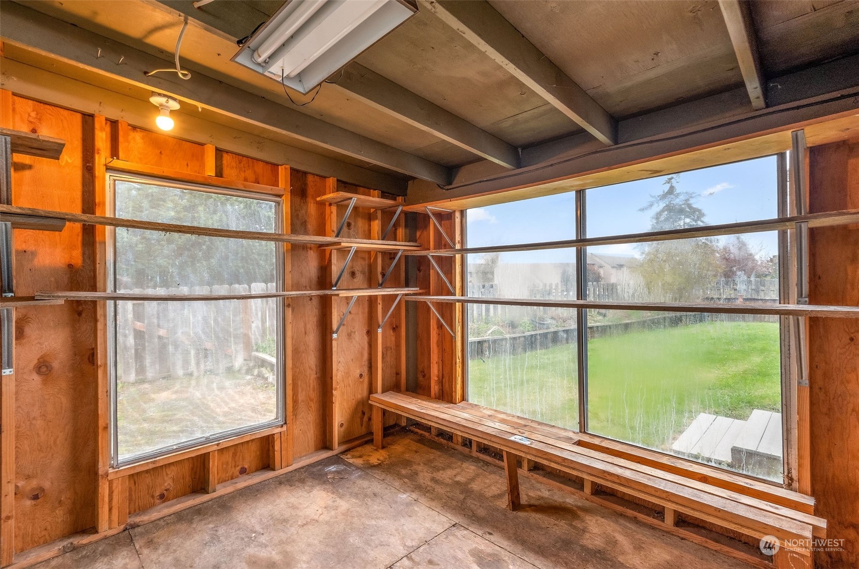 720 Memory Lane Port Townsend, WA 98368 - Photo 30 of 33 a view of a room with wooden floor and windows