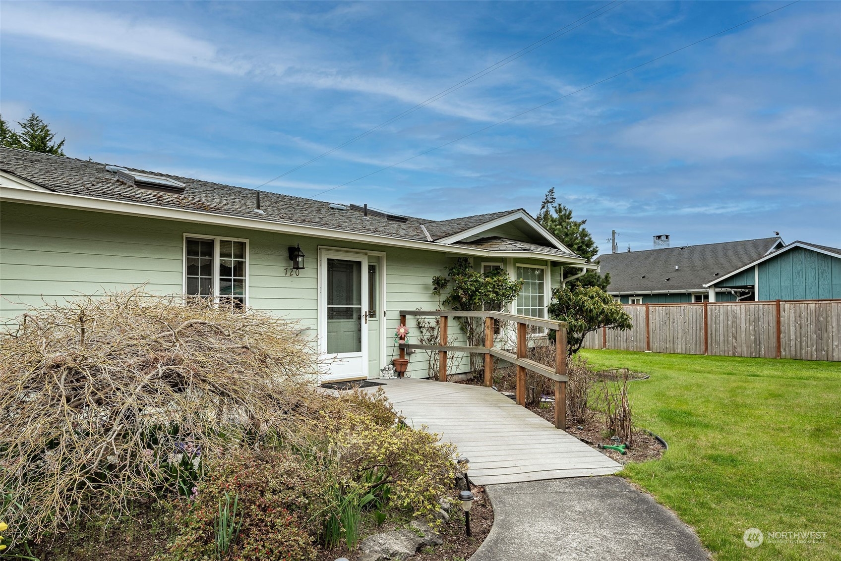 720 Memory Lane Port Townsend, WA 98368 - Photo 3 of 33 front view of a house with a yard
