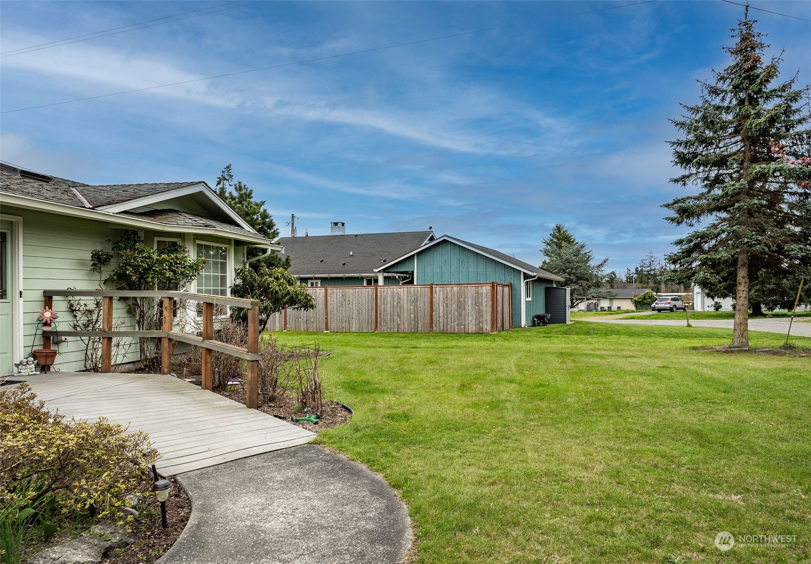 720 Memory Lane Port Townsend, WA 98368 - Photo 4 of 33 a front view of a house with a yard