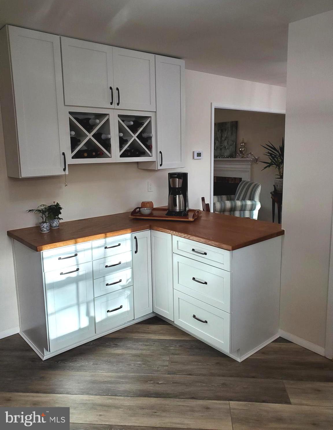 106 Cheltenham Road Newark, DE 19711 - Photo 4 of 23 White Shaker Cabinets w/ coffee and wine bar area