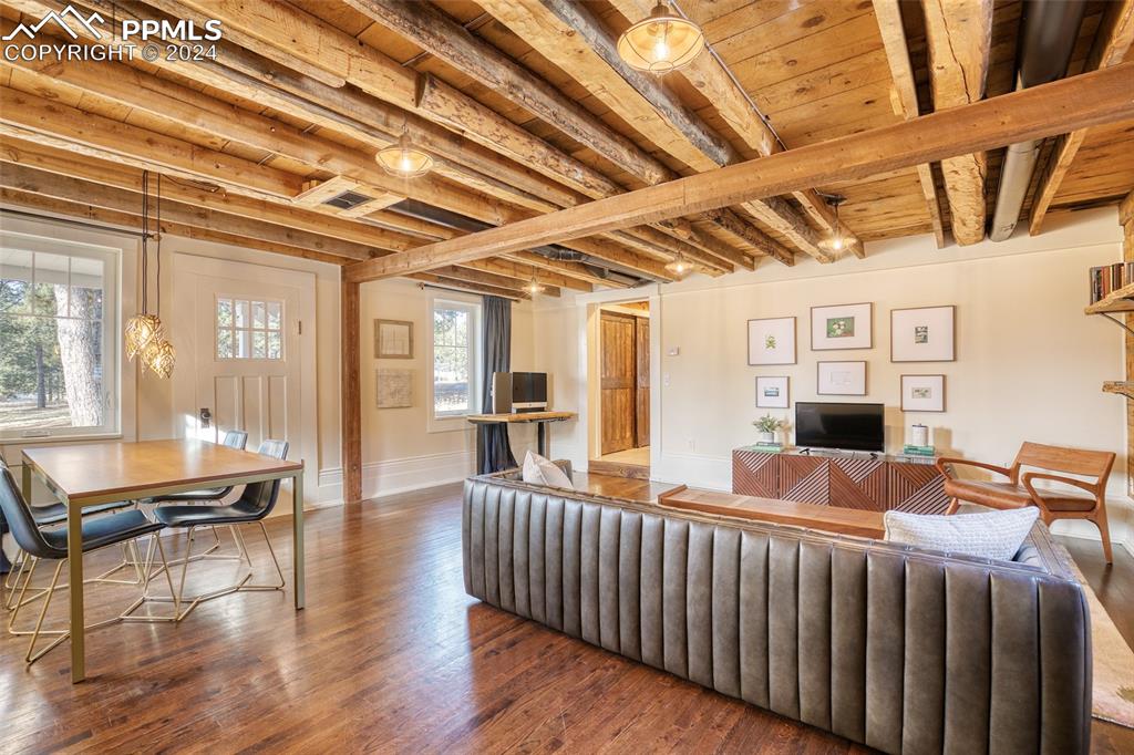 11508 Shaugnessy Road Colorado Springs, CO 80908 - Photo 26 of 49 a bedroom with furniture and a window