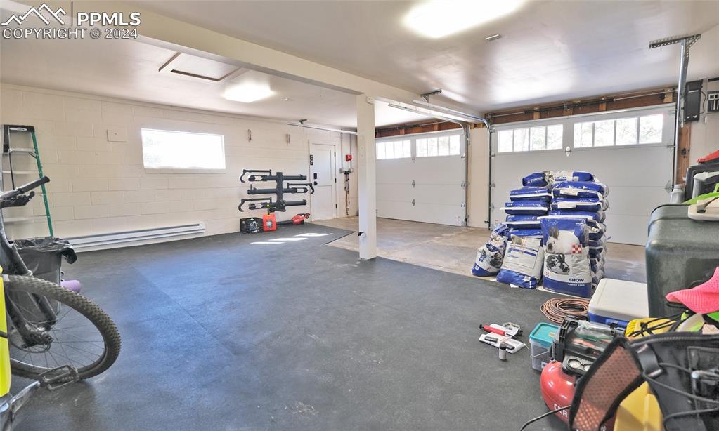 11508 Shaugnessy Road Colorado Springs, CO 80908 - Photo 33 of 49 a view of a room with gym equipment