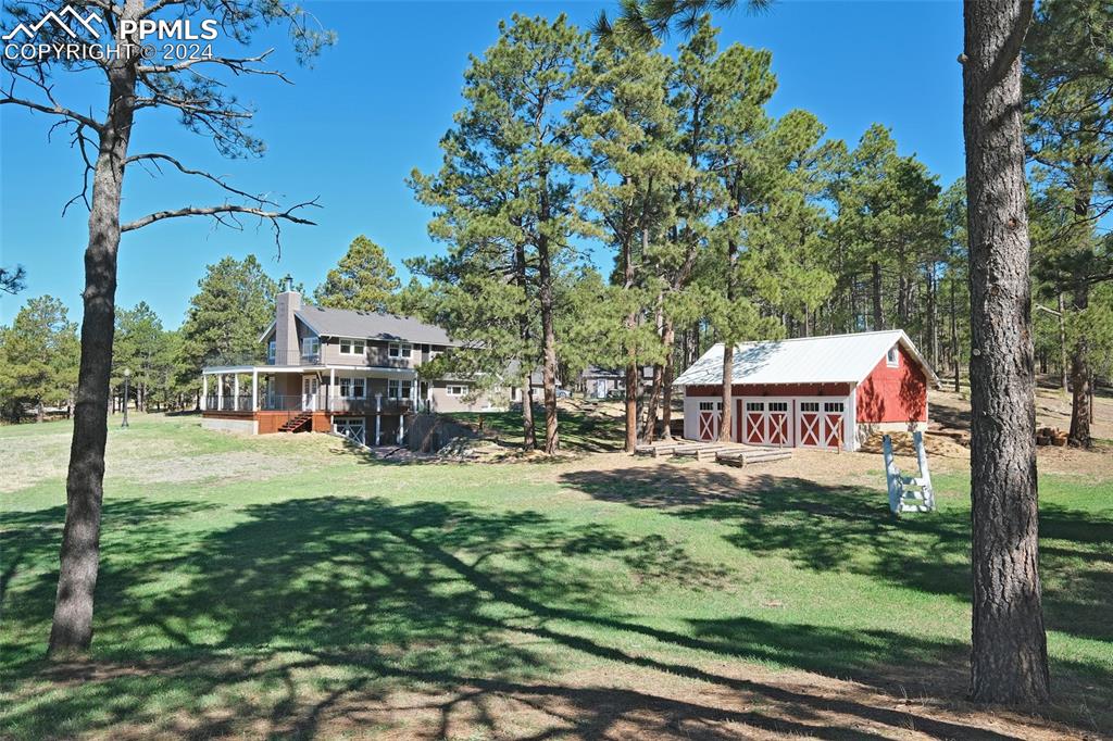 11508 Shaugnessy Road Colorado Springs, CO 80908 - Photo 36 of 49 a sign board with yard in front of it