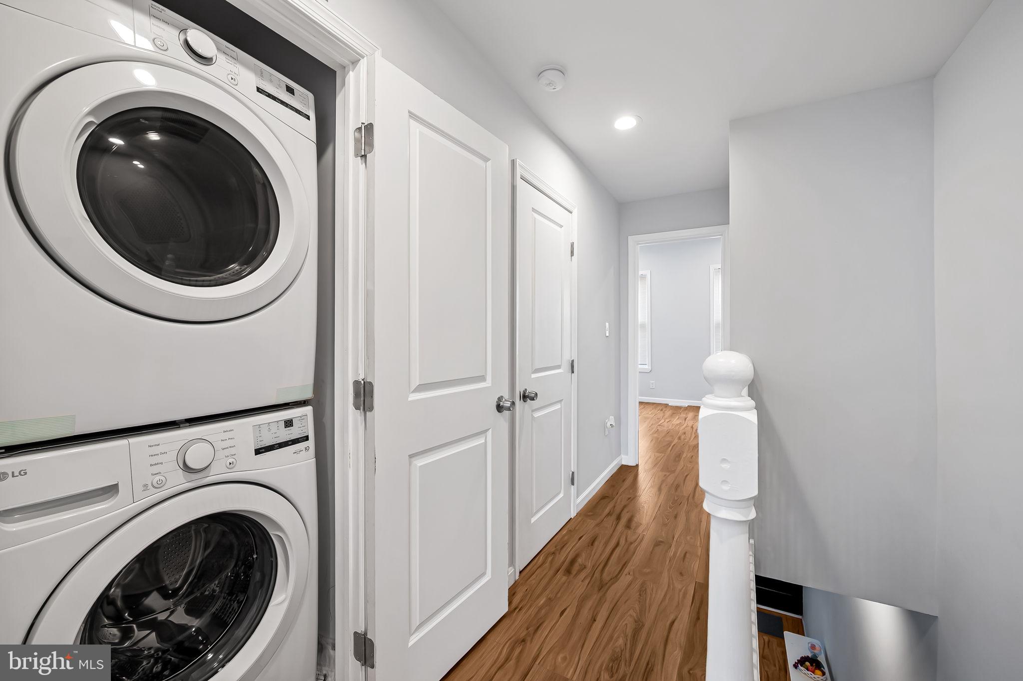 512 North Port Street Baltimore, MD 21205 - Photo 12 of 23 a view of a hallway with washer and dryer