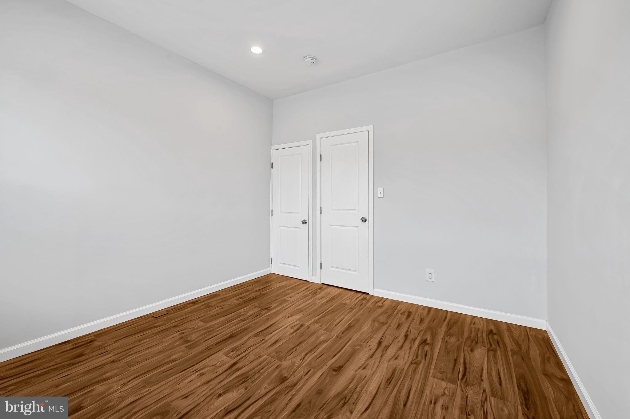 512 North Port Street Baltimore, MD 21205 - Photo 17 of 23 a view of a room with wooden floor