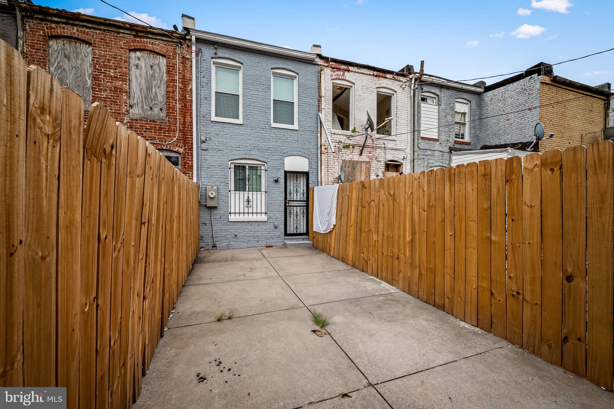 512 North Port Street Baltimore, MD 21205 - Photo 23 of 23 a view of a house with a wooden door