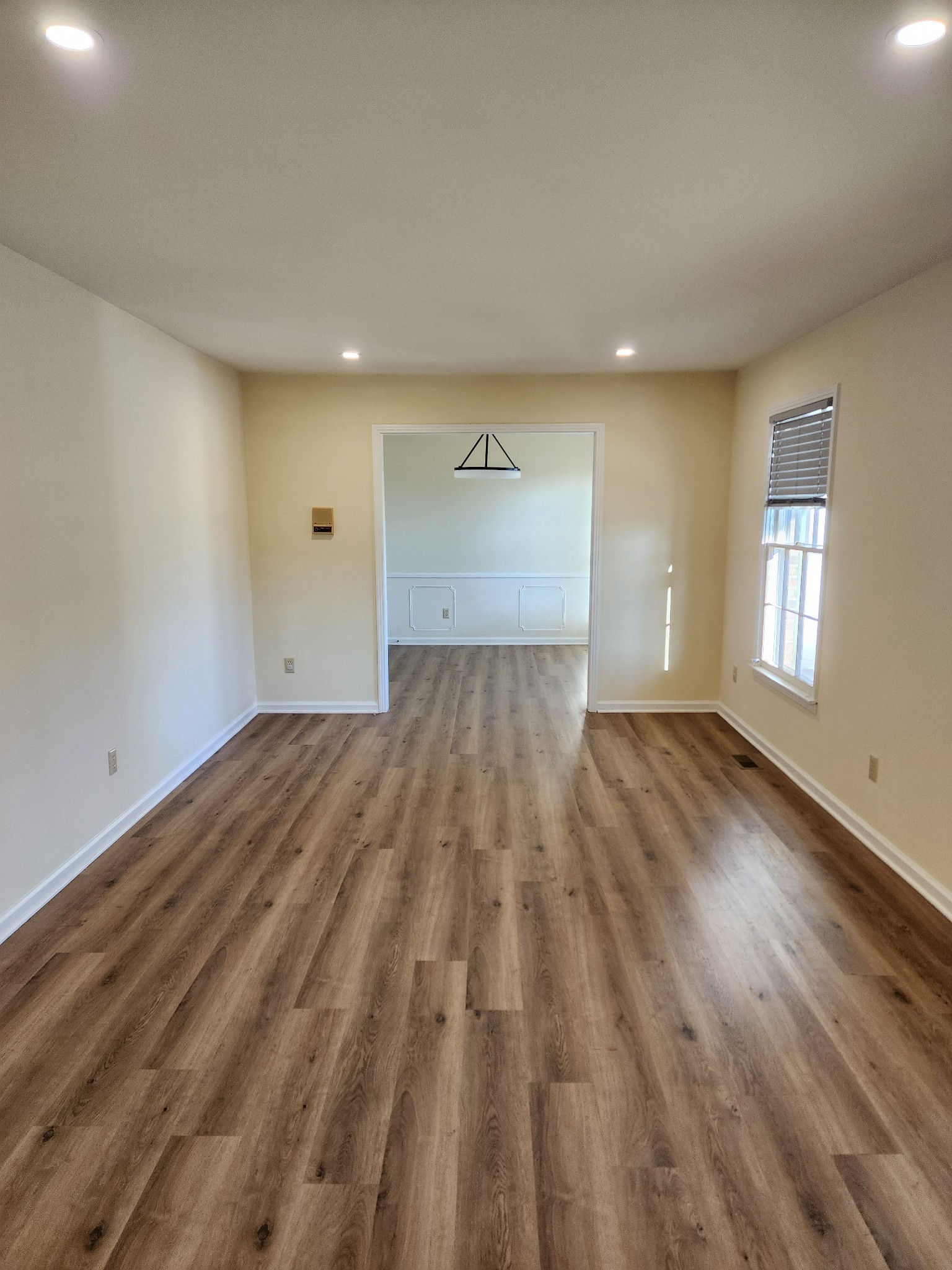 303 12 Oaks Road Tullahoma, TN 37388 - Photo 11 of 39 a view of empty room with wooden floor and fan