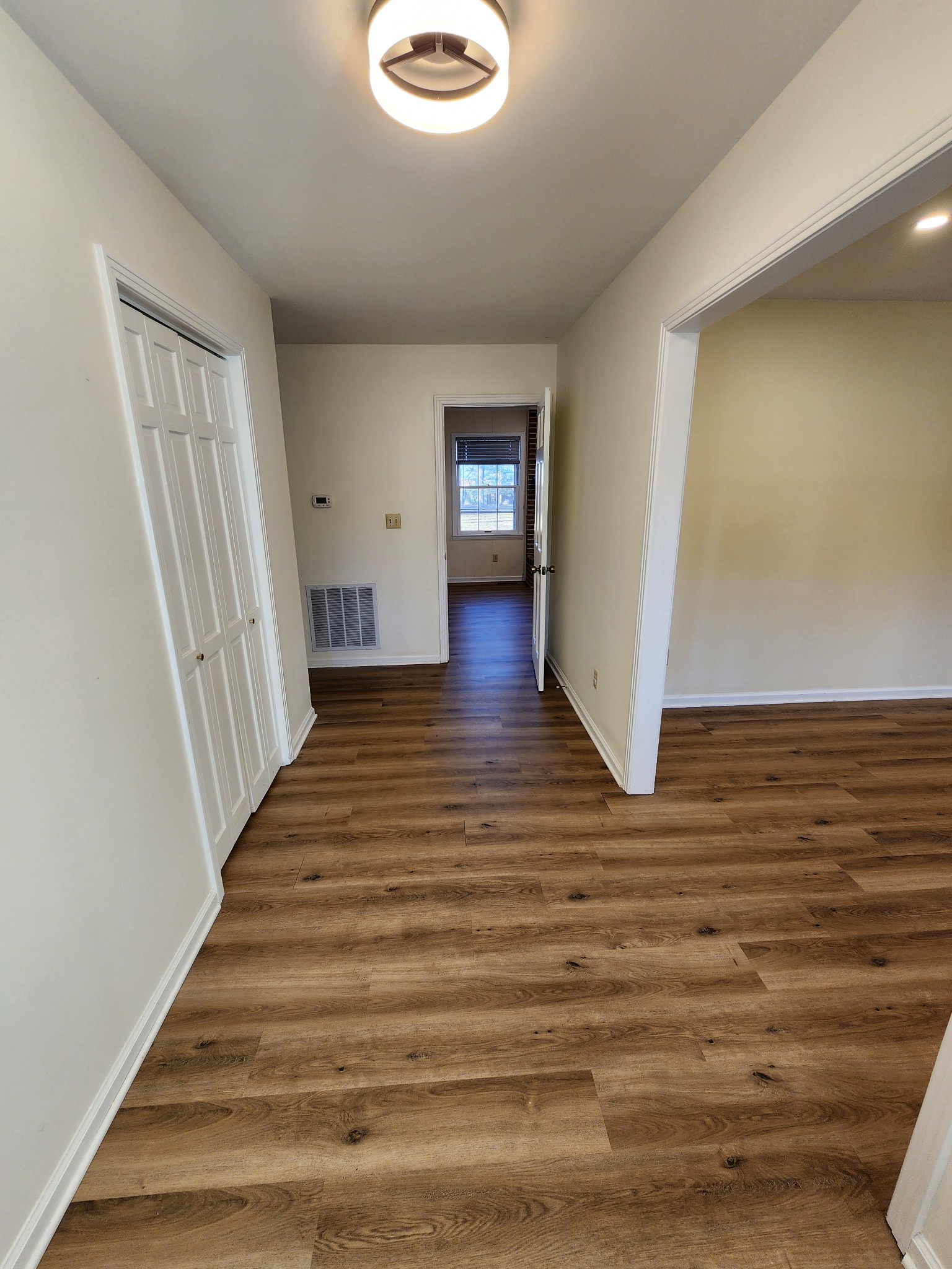 303 12 Oaks Road Tullahoma, TN 37388 - Photo 9 of 39 a view of a hallway view with wooden floor and staircase