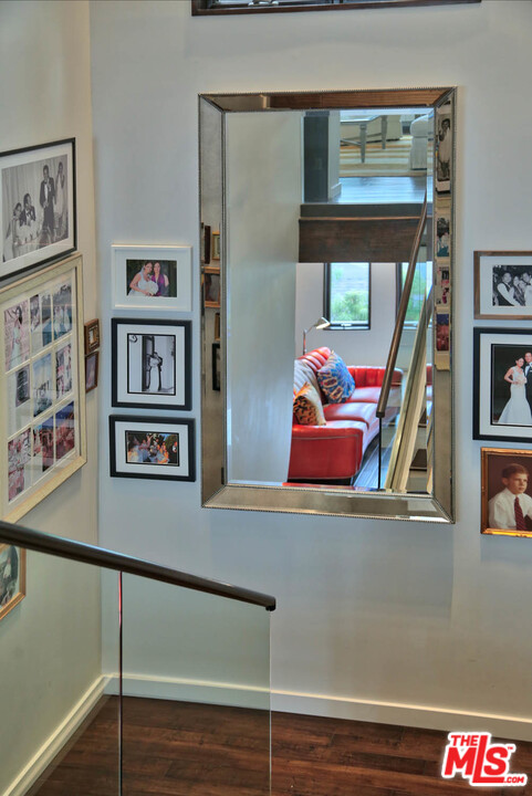 8532 Ridpath Drive Los Angeles, CA 90046 - Photo 27 of 52 a room with furniture and a book shelf