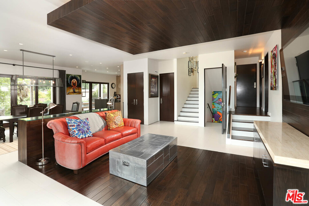 8532 Ridpath Drive Los Angeles, CA 90046 - Photo 3 of 52 a living room with furniture and wooden floor