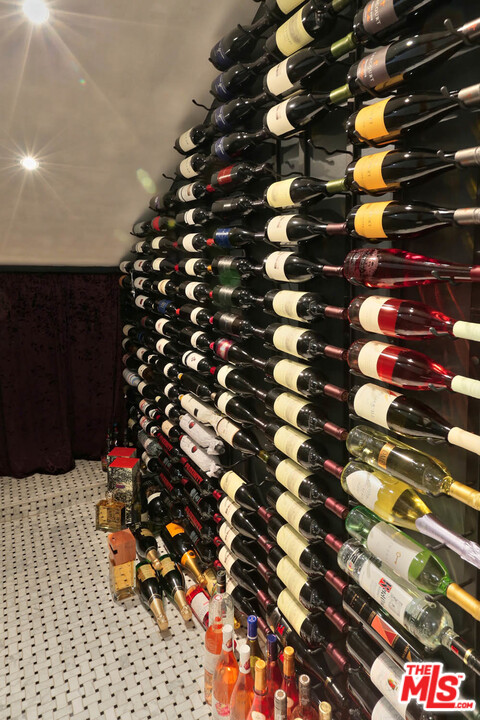 8532 Ridpath Drive Los Angeles, CA 90046 - Photo 31 of 52 a bunch of flowers sitting in a storage