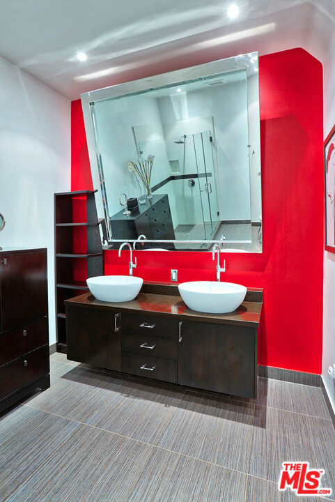 8532 Ridpath Drive Los Angeles, CA 90046 - Photo 36 of 52 a room with red walls and stairs