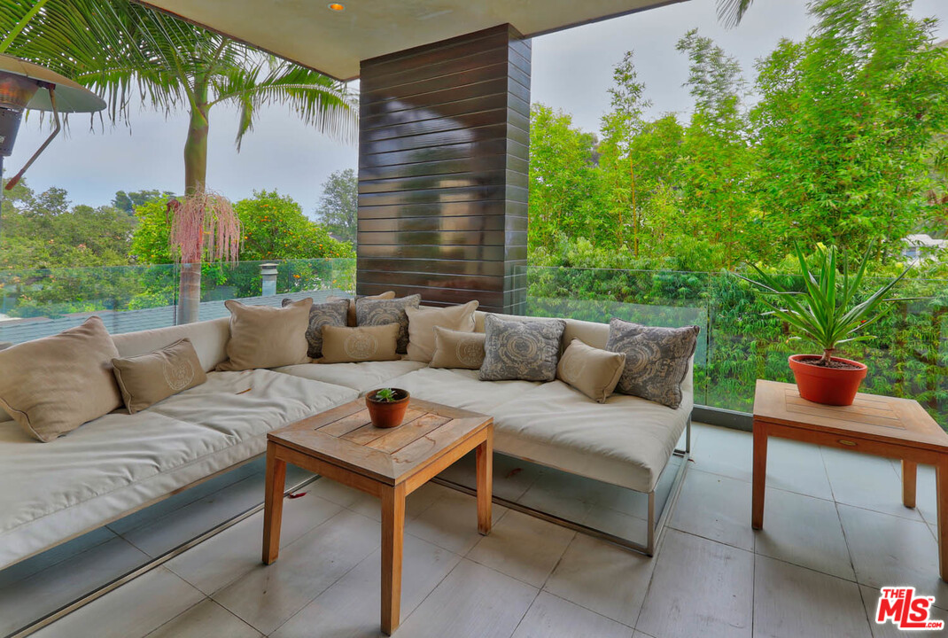 8532 Ridpath Drive Los Angeles, CA 90046 - Photo 39 of 52 a outdoor living space with furniture and a potted plant