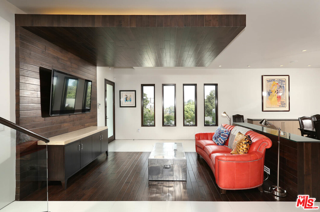 8532 Ridpath Drive Los Angeles, CA 90046 - Photo 4 of 52 a living room with furniture and a wooden floor