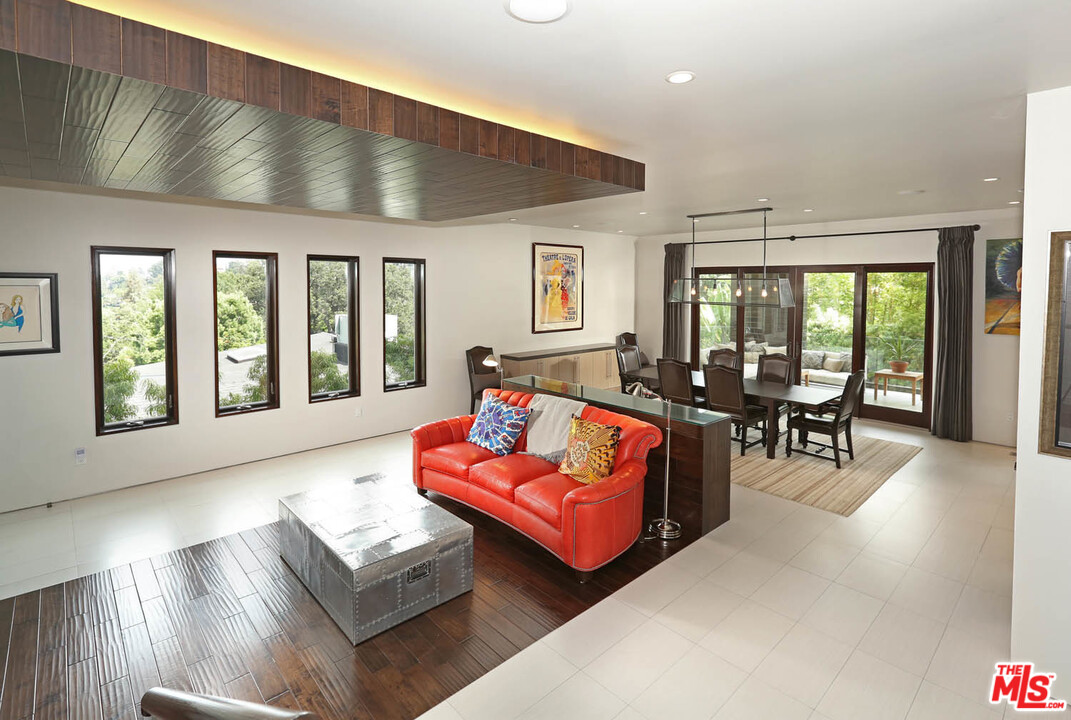 8532 Ridpath Drive Los Angeles, CA 90046 - Photo 5 of 52 a living room with furniture and large windows