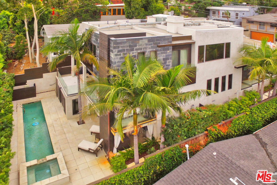 8532 Ridpath Drive Los Angeles, CA 90046 - Photo 52 of 52 a aerial view of a multi story residential apartment building with a yard