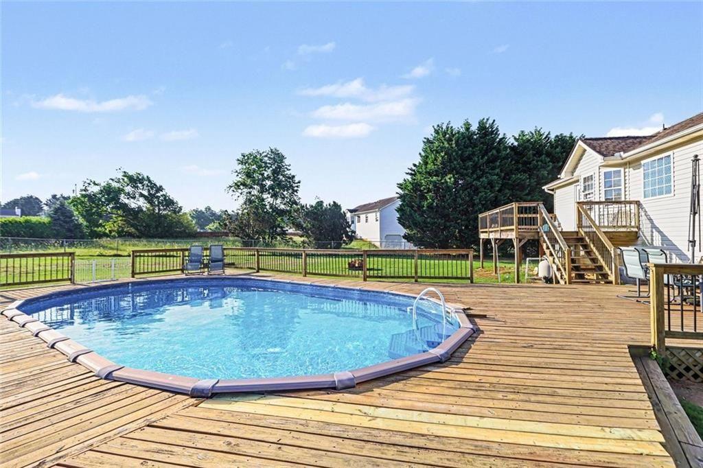 302 Fairview Lane Dallas, GA 30157 - Photo 25 of 26 a view of a swimming pool with an outdoor space