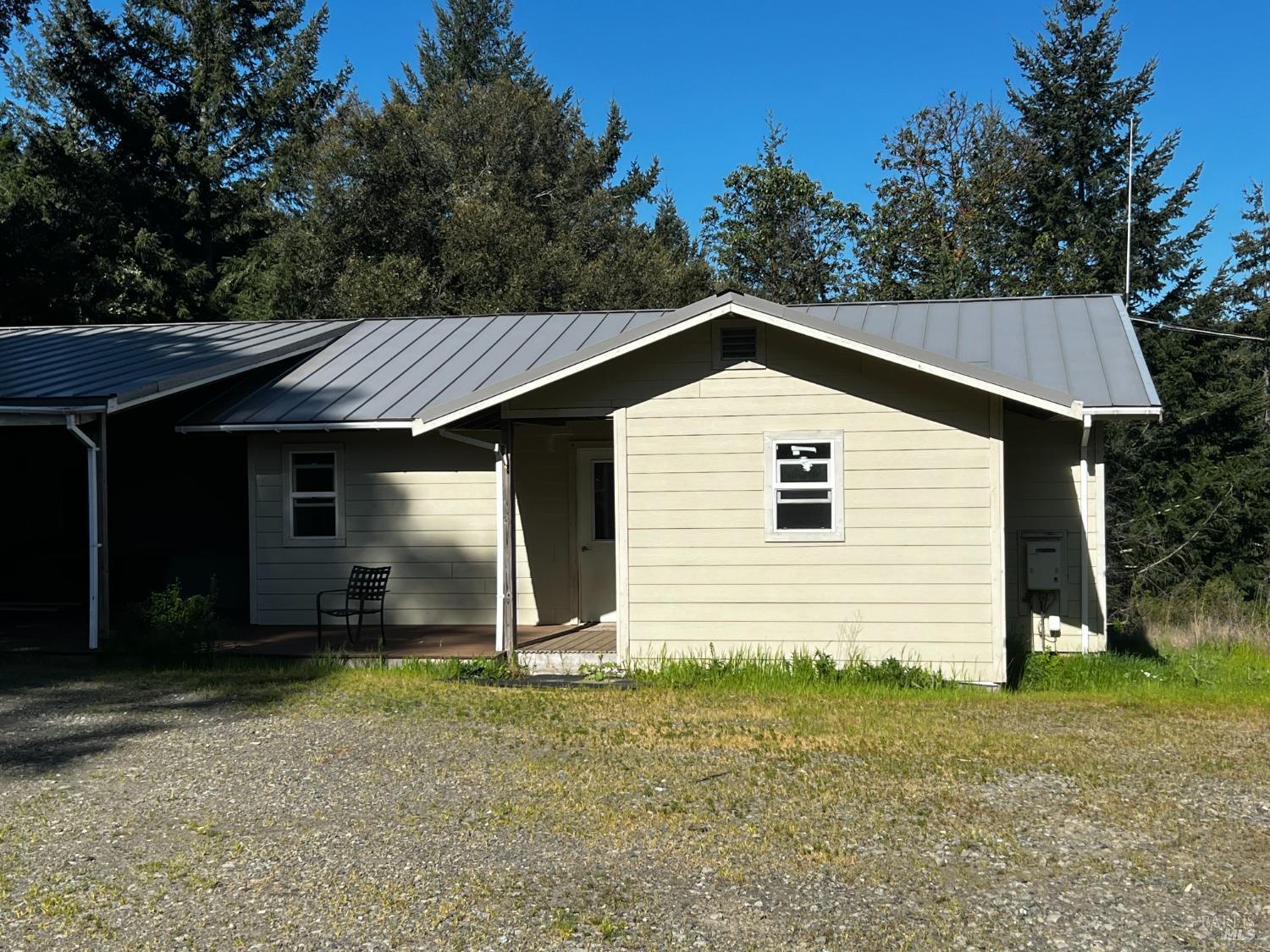 3761 East Blue Rock Road Garberville, CA 95542 - Photo 5 of 38 a view of a house with a yard