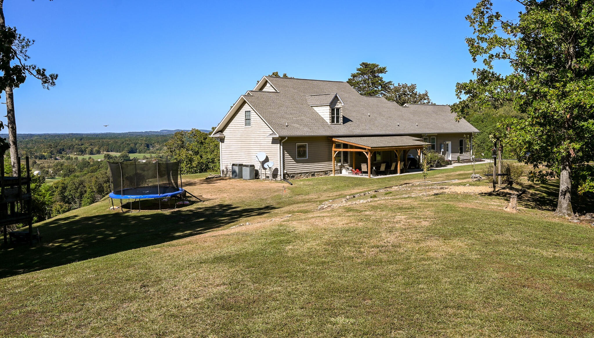 360 Harris Road Old Fort, TN 37362 - Photo 74 of 82 a front view of a house with a yard