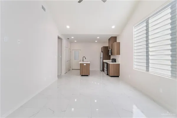 a room with furniture and a window