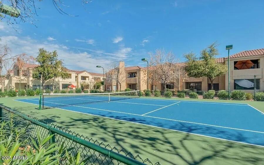 7575 East Indian Bend Road, Unit 2002 Scottsdale, AZ 85250 - Photo 15 of 24 a view of a tennis court