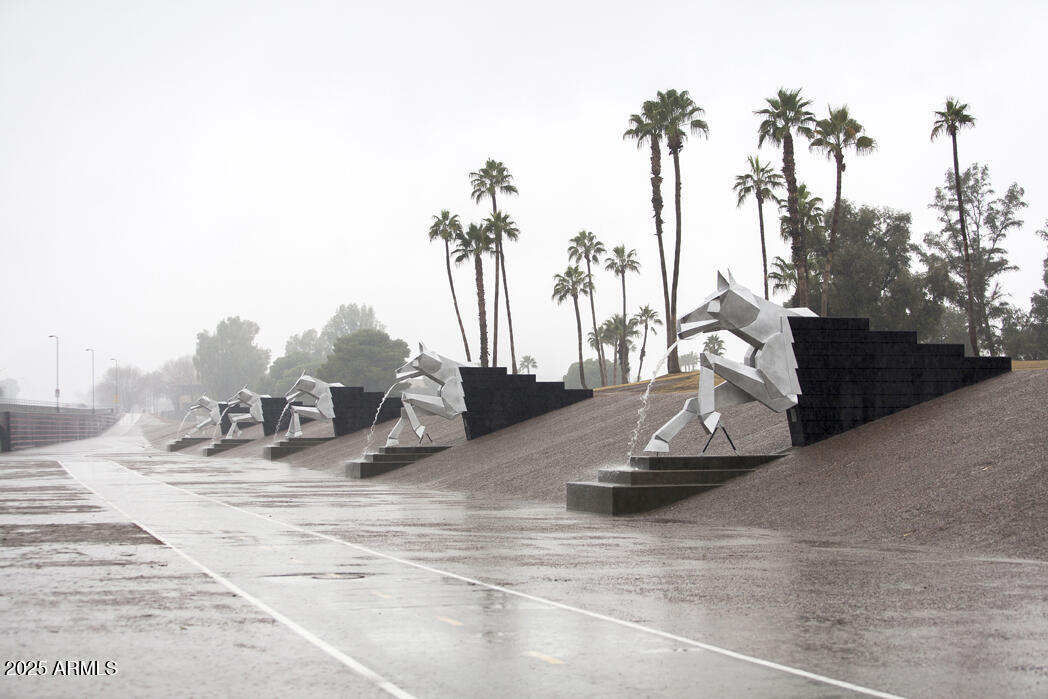 7575 East Indian Bend Road, Unit 2002 Scottsdale, AZ 85250 - Photo 18 of 24 a view of a park with swings and slides