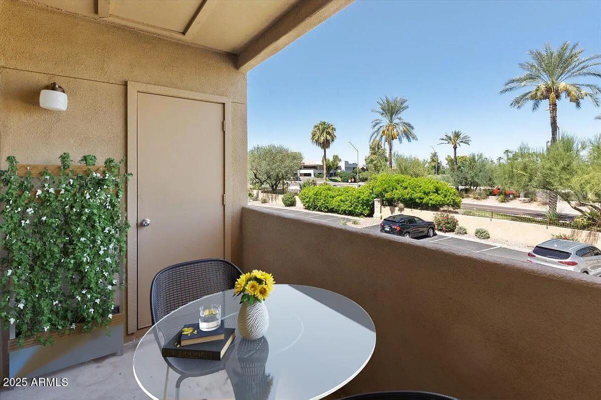 7575 East Indian Bend Road, Unit 2002 Scottsdale, AZ 85250 - Photo 7 of 24 a view of a porch with furniture