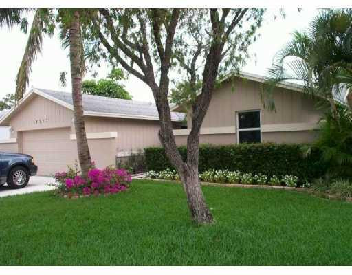 9117 Affirmed Lane Boca Raton, FL 33496 - Photo 1 of 8 Exterior Front