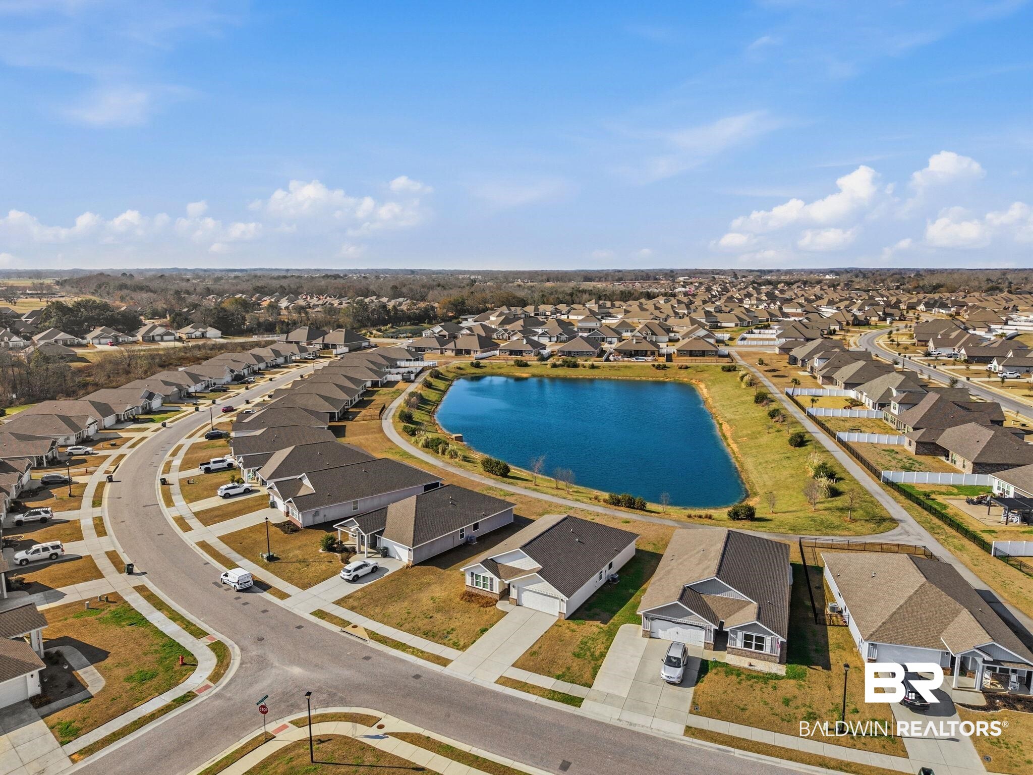 23952 Citation Loop Daphne, AL 36526 - Photo 66 of 69 Aerial perspective of suburban area featuring a large body of water