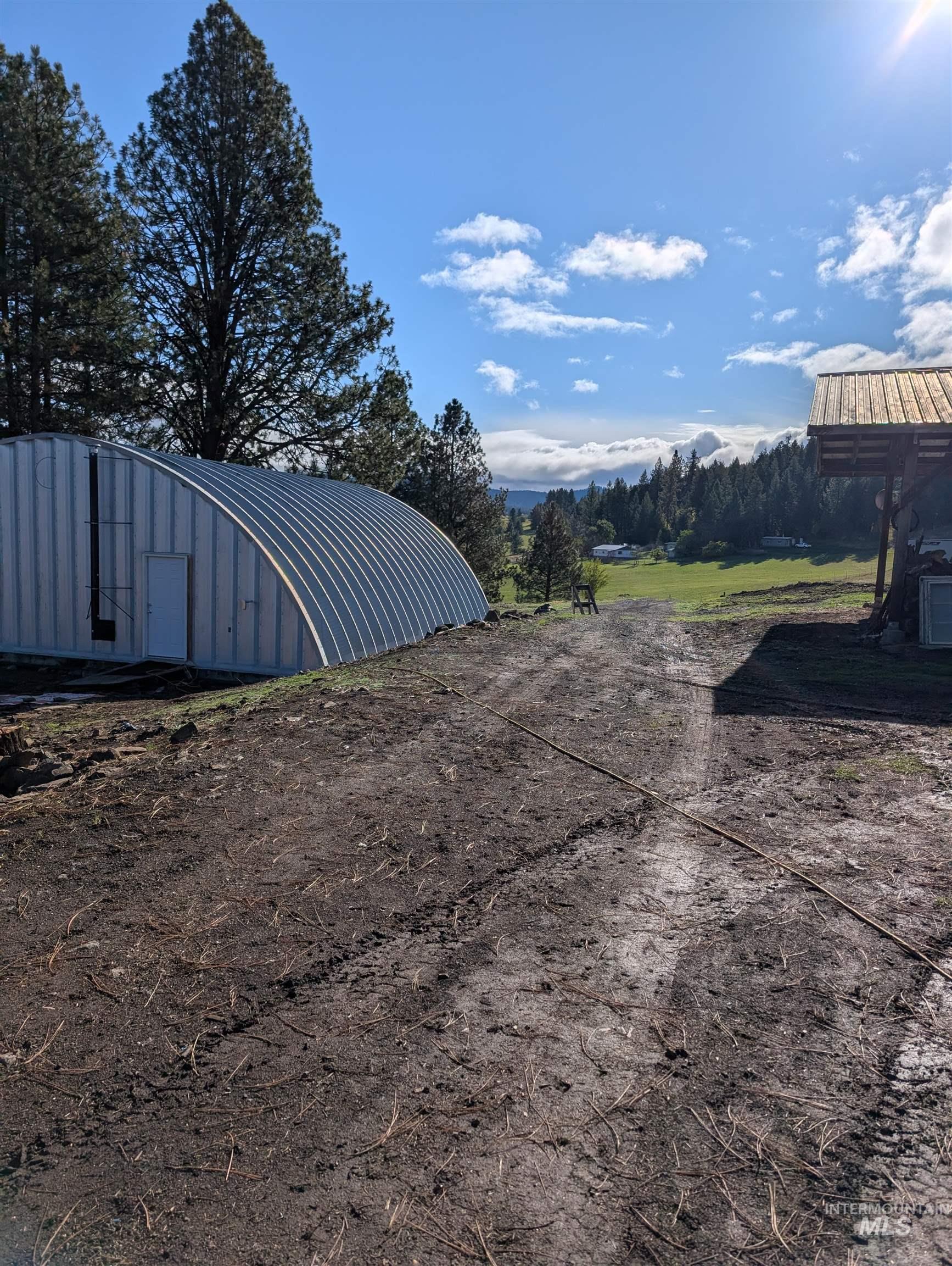 784 Leitch Creek Road Kooskia, ID 83539 - Photo 24 of 24 View of yard featuring an outbuilding and a pole building