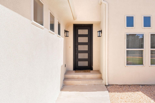 7776 Wagon Road East St. George, UT 84770 - Photo 4 of 76 Entrance to property with stucco siding