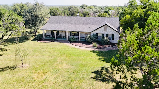 125 Kyle Lane Georgetown, TX 78633 - Photo 1 of 34 a aerial view of a house with swimming pool and green space