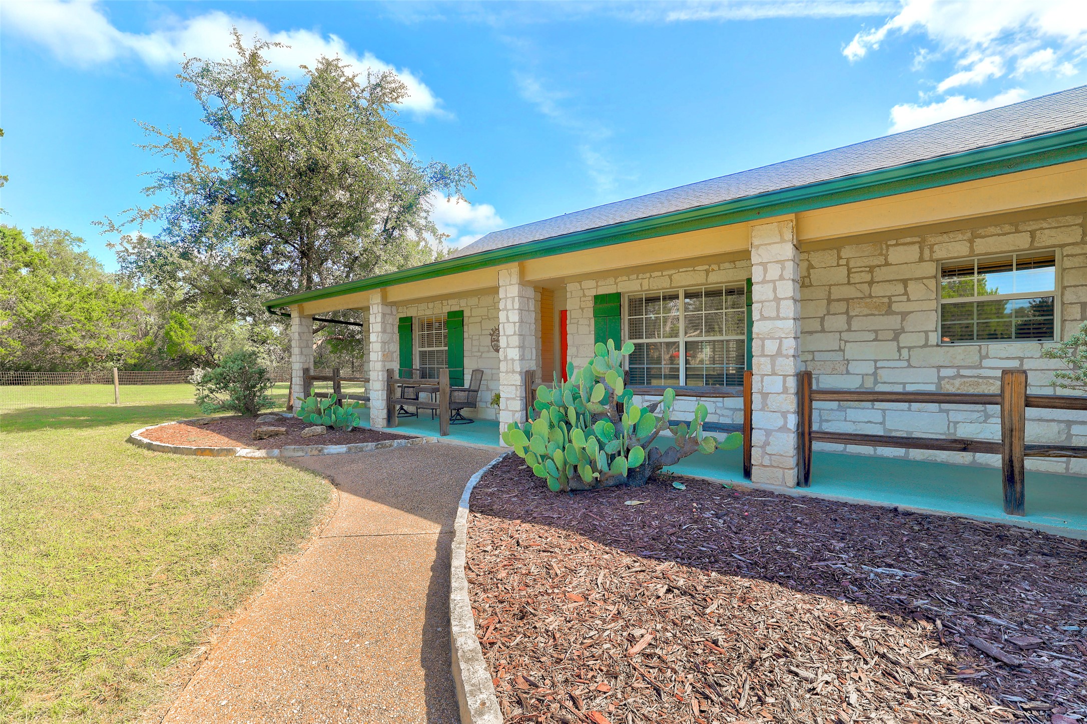 125 Kyle Lane Georgetown, TX 78633 - Photo 8 of 34 a view of a house with backyard porch and garden