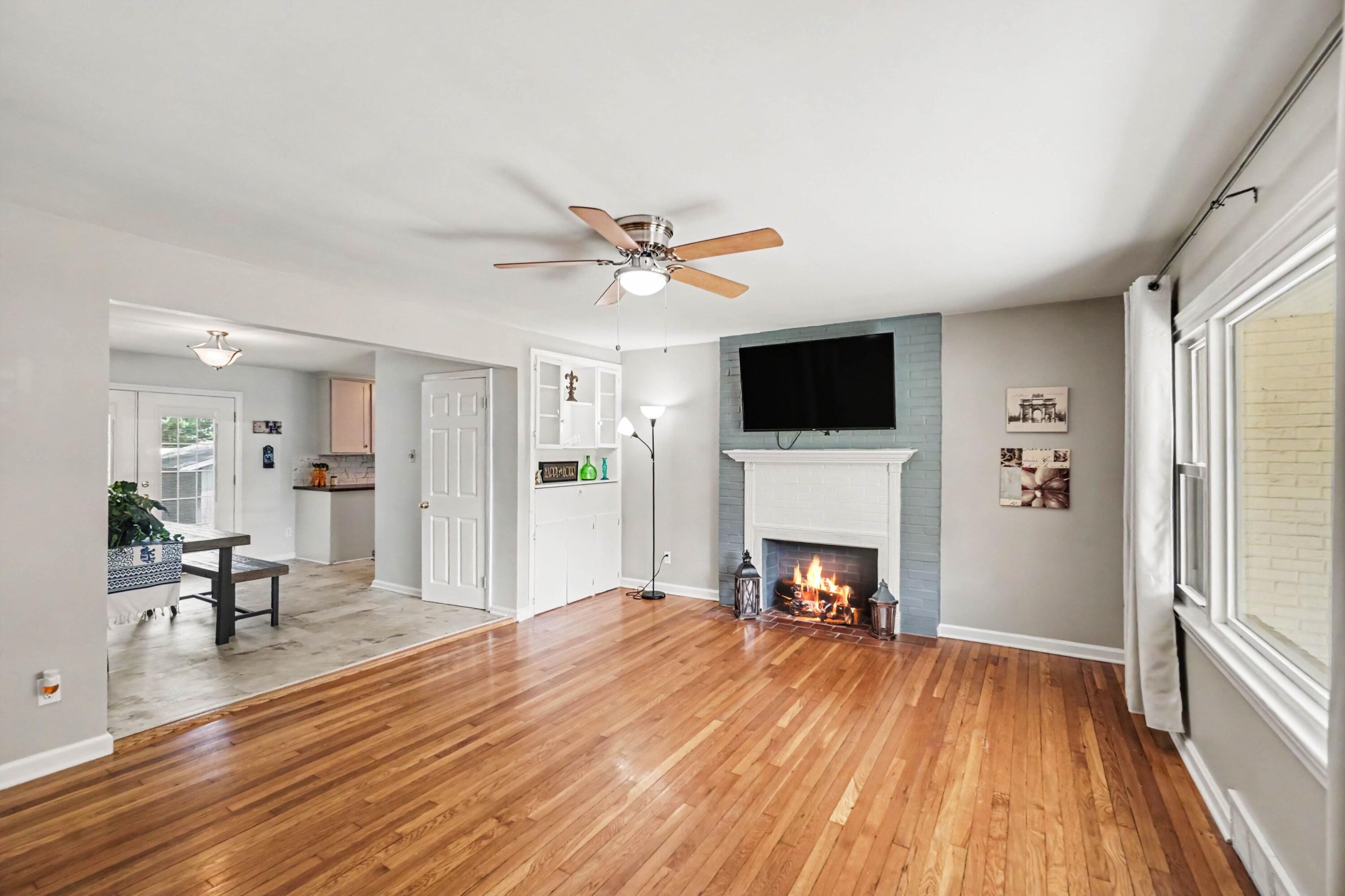 483 Springhill Drive Lexington, KY 40503 - Photo 11 of 30 Original hardwood floors enhance the charm and character of the spacious living room.